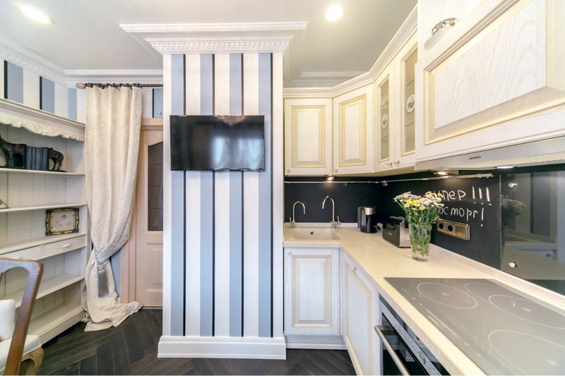 Kitchen with striped wallpaper