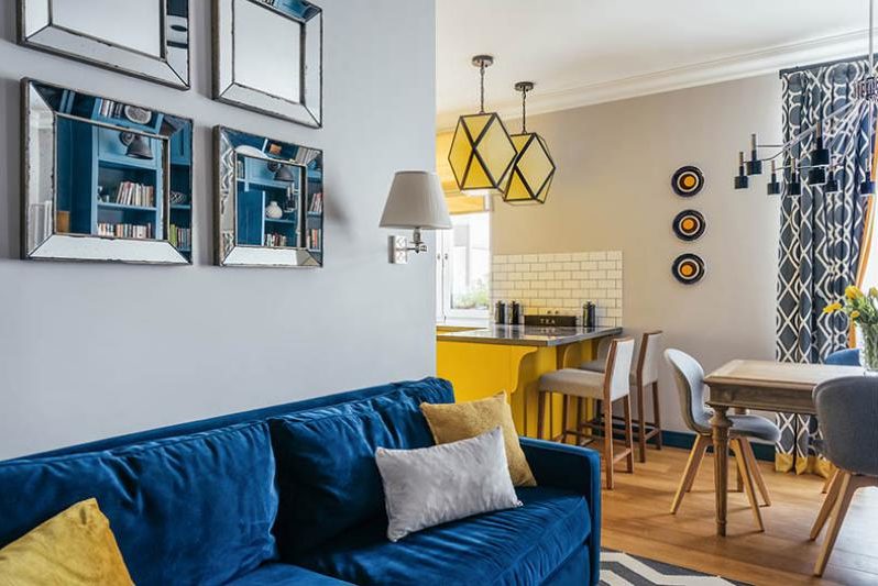 Kitchen-living room in yellow and blue tones